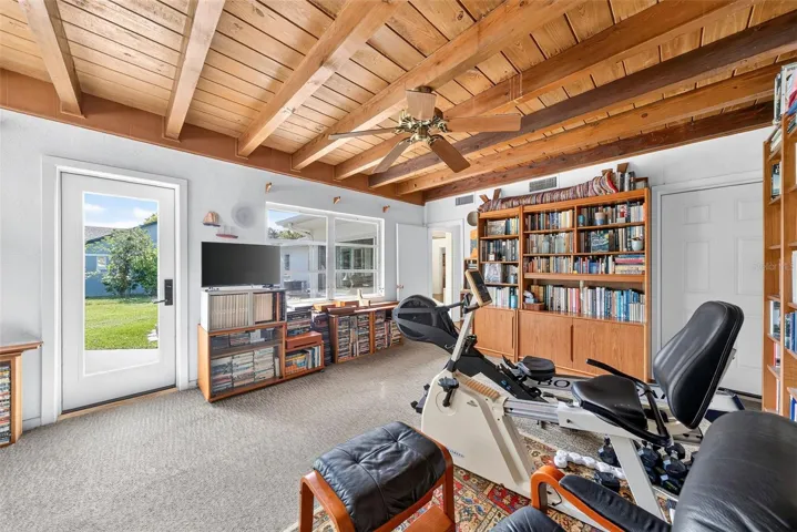 Florida room with door to the pool