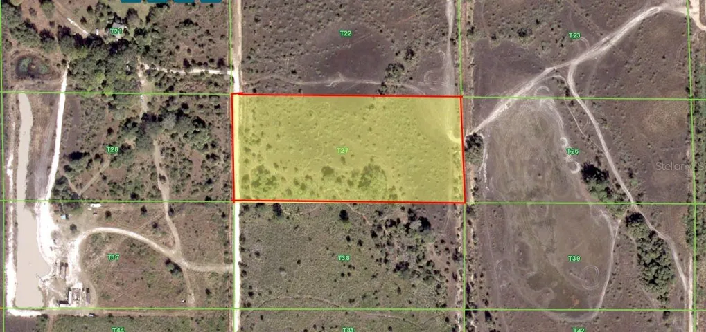 Aerial of the 5 acres.  Electric service on the road.