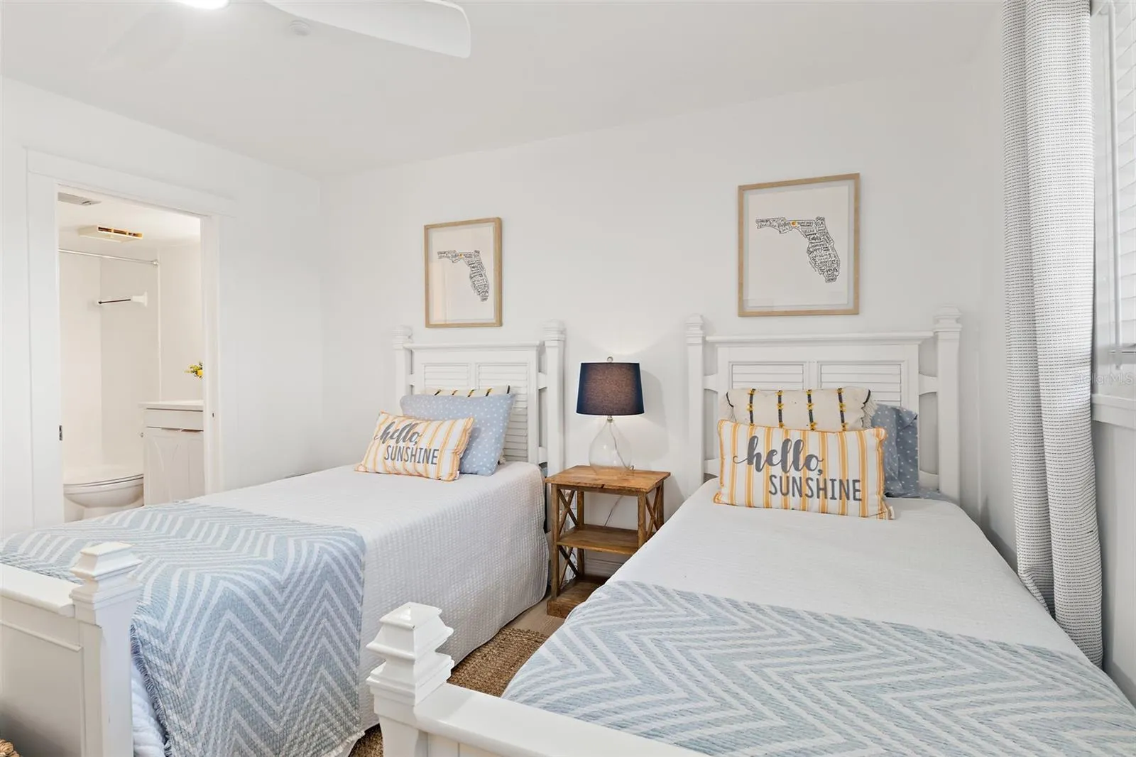 Guest bedroom with twin beds — 2-bedroom, 2.5-bath condo in Cocoa Beach, Florida