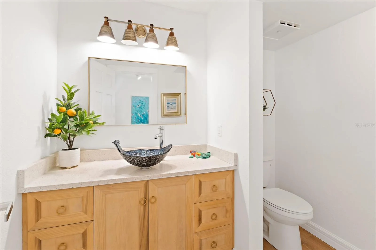 Powder bathroom with mosaic glass vessel sink, Quartz vanity — Cocoa Beach condo