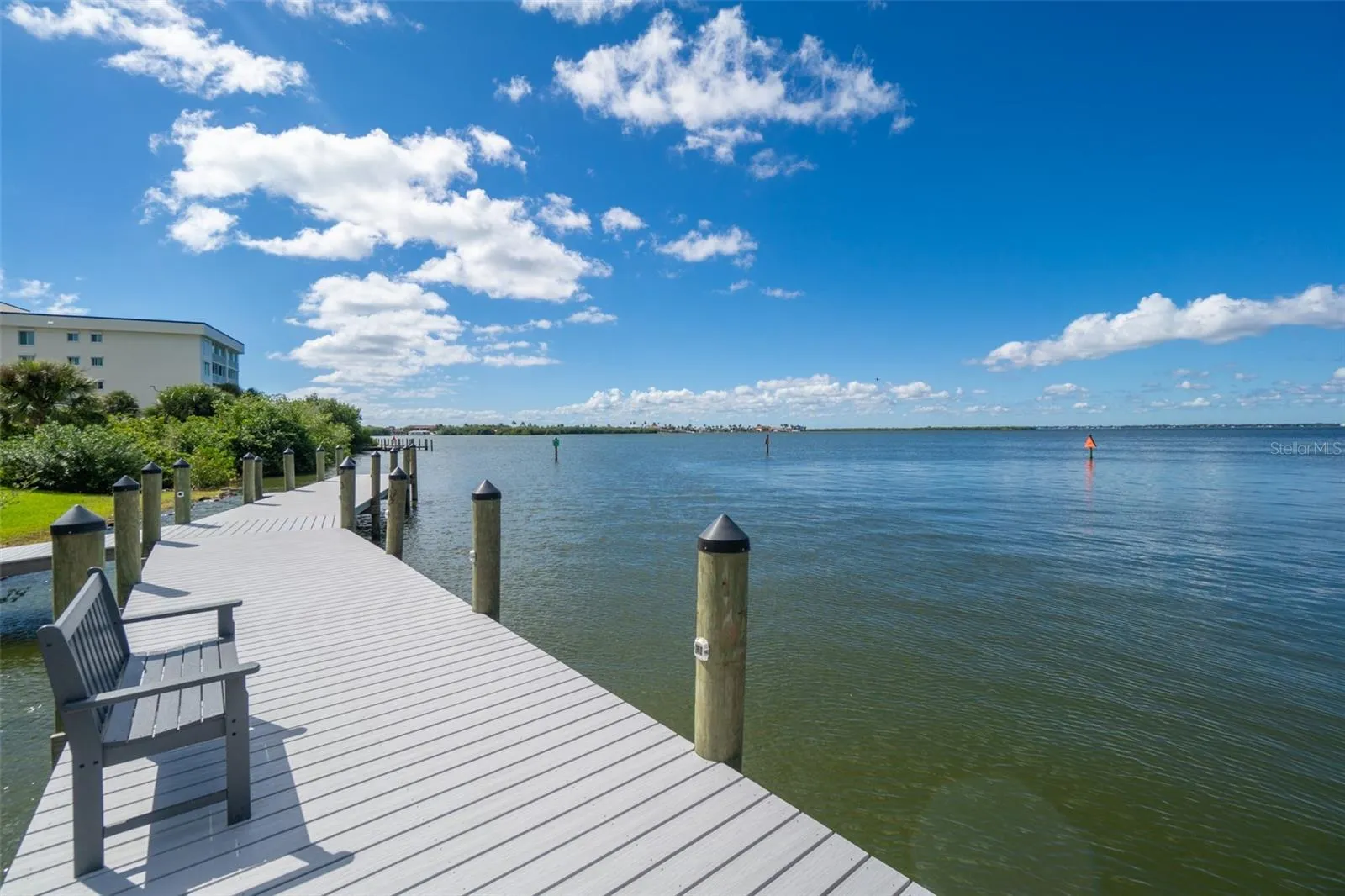 Banana River water views with Riverwest condo building along the shoreline, Cocoa Beach