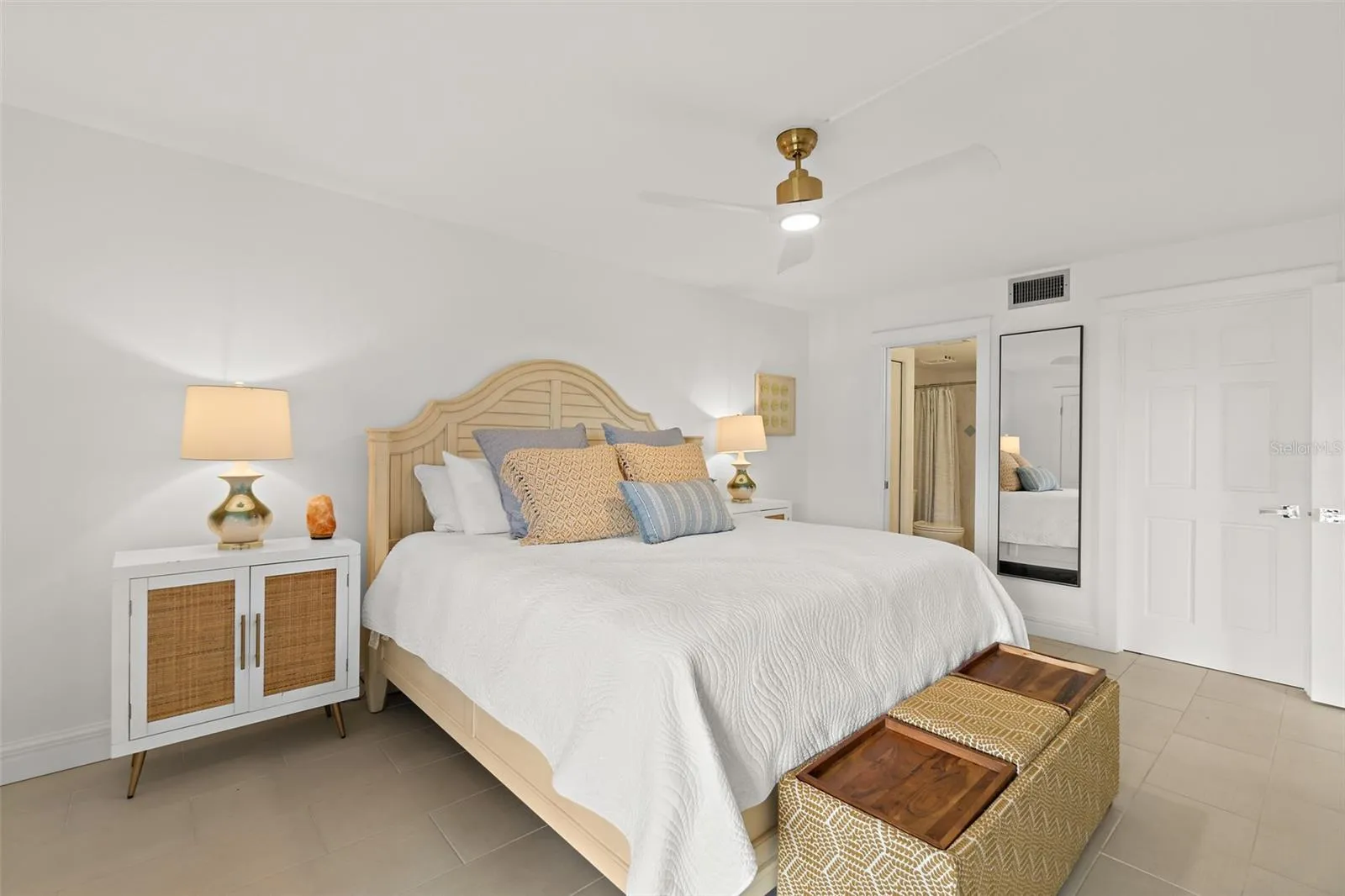 Primary bedroom with en-suite bathroom access and walk-in closet, Riverwest condo, Cocoa Beach