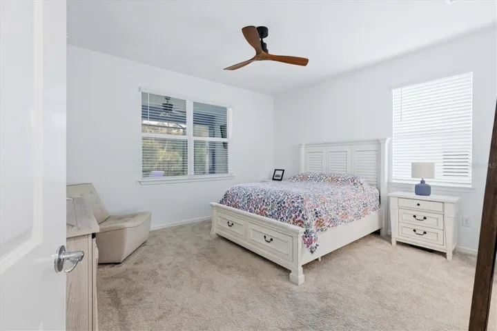 Primary bedroom has carpet and is a good sized room