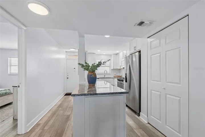 Island looking back at kitchen.