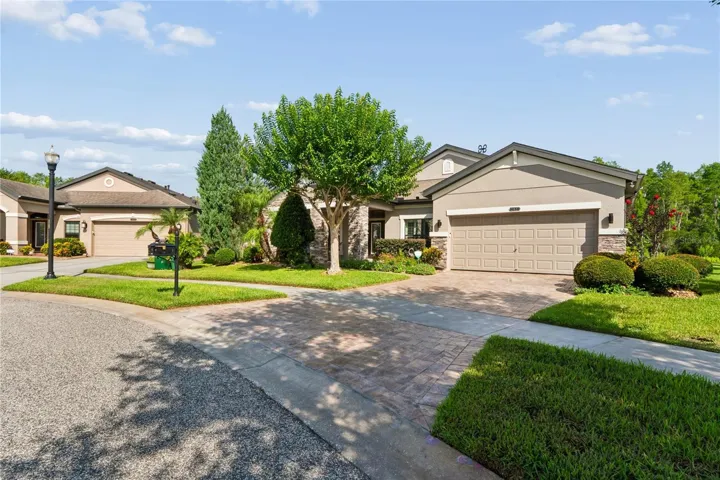 Immaculate Upkeep and View of the Paved Driveway Leading to Pearl Crescent Ct.