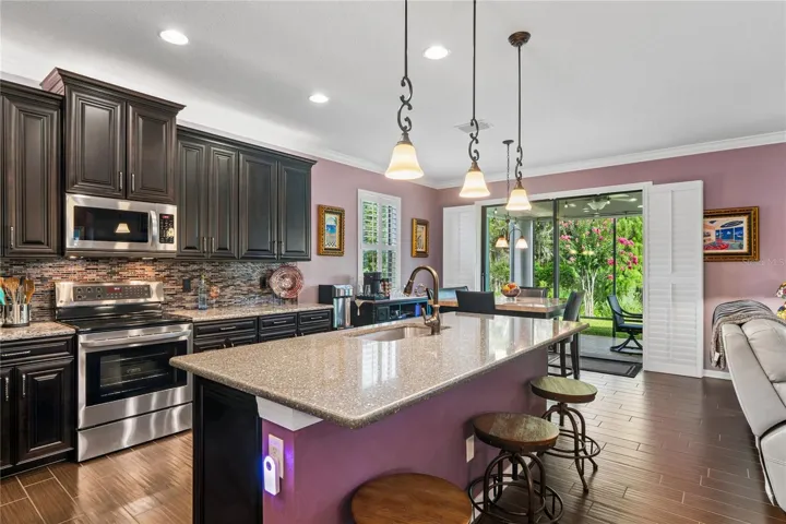 Large Open Kitchen with Abundant Lighting and Storage