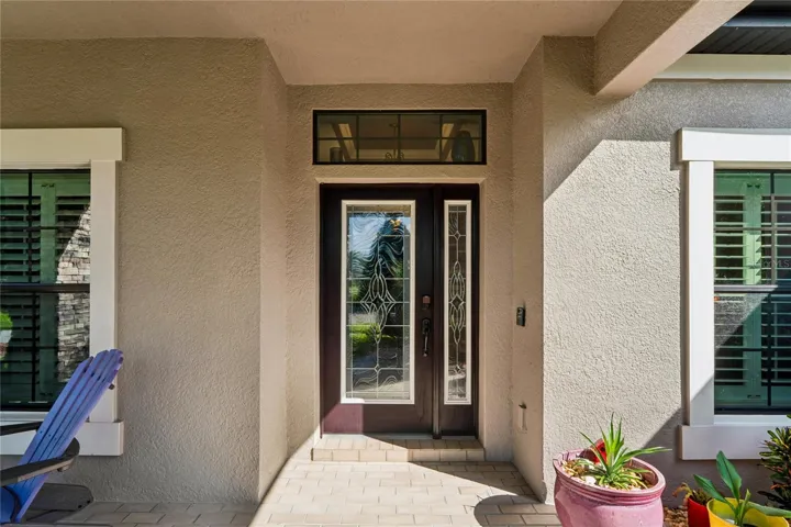 Extra Light Pours in from the Glass Door and Transom Window Inviting You into the Home