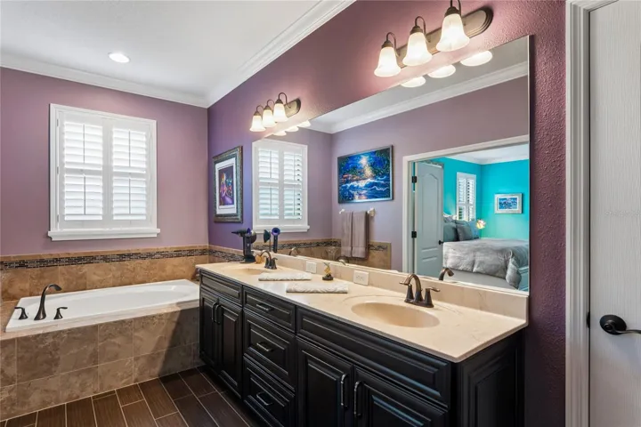 Separate Garden Tub in the Primary Bathroom with Matching Rubbed Bronze Faucet