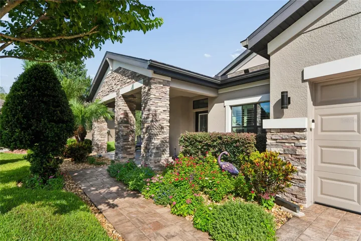 The Paved Walkway Leading to the Front Door Invites You into the Home