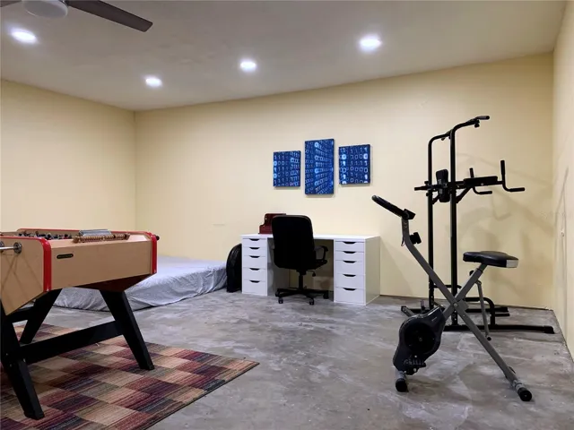 Better shot of the workout stuff and desk.