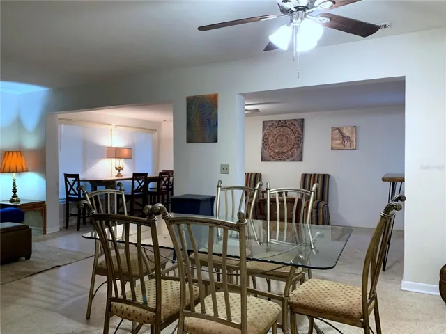 Overall view across the dining area into the Florida room
