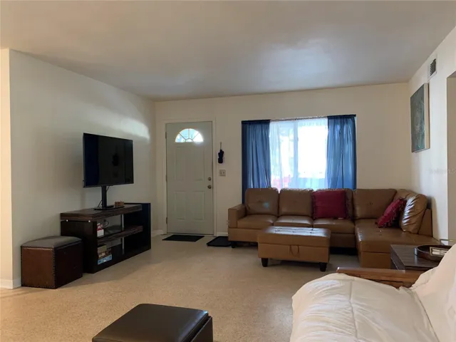 Main family room; looking at the front door.