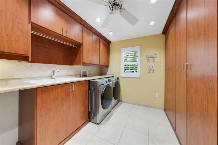 Expansive laundry room with storage