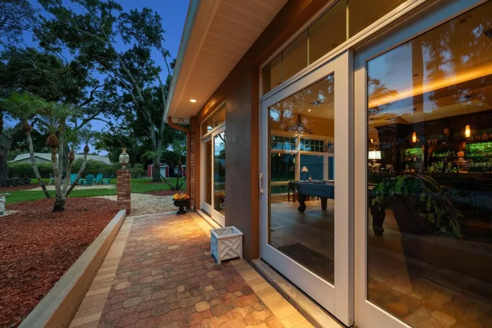 Sliding glass doors leading to back yard