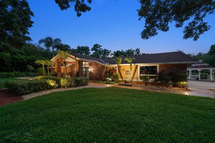 Front of home with lighting