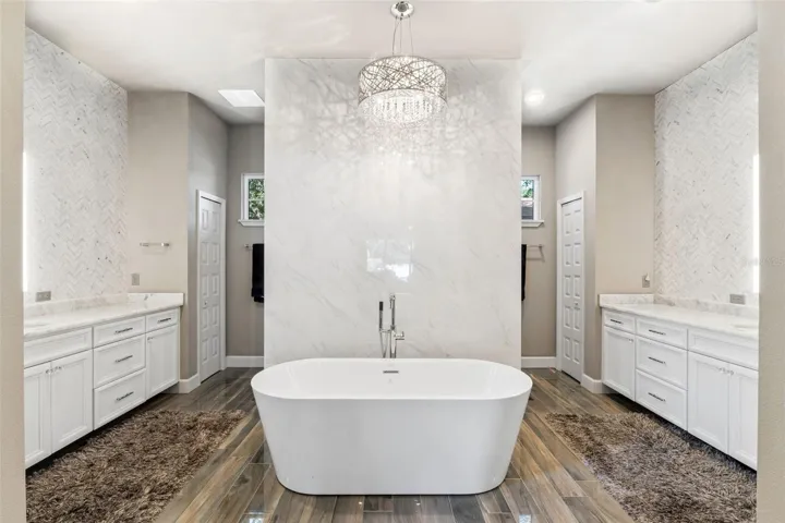 Polished Ceramic tile floor with dual linen closets