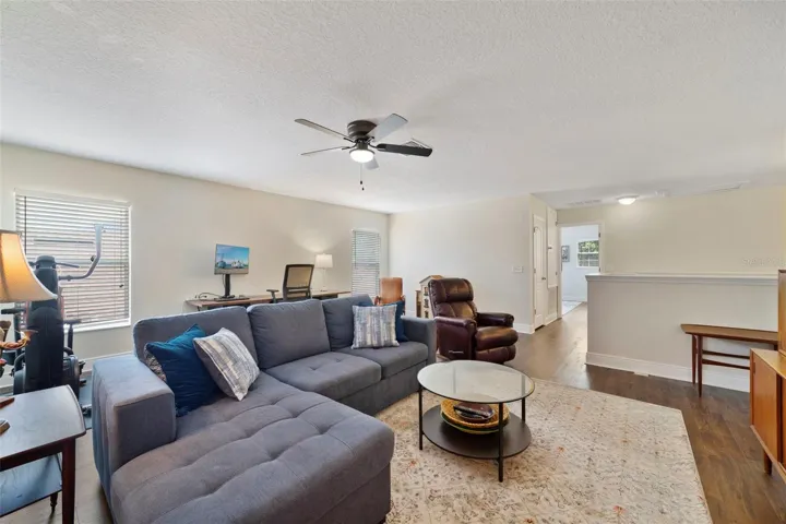 Upstairs, you will find three additional bedrooms, a second full bath, and an oversized loft with endless possibilities – media room, game room, home office, fitness space, or even a potential FIFTH BEDROOM.
