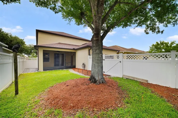 Fenced yard space, 2-car rear facing garage.