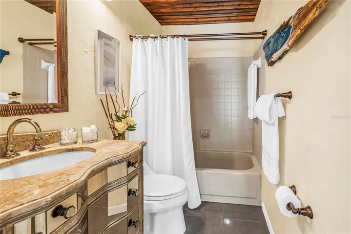 Downstairs Full Bath Serves Office/Bedroom 3 and Guests