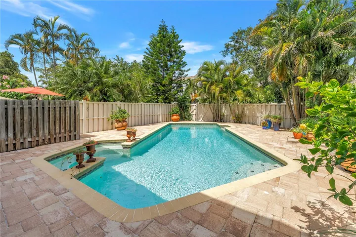 Not a small pool, room for small folks or large gatherings.  Paver Deck is in fantastic condition