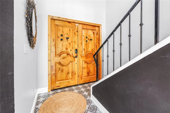 Amazing Custom French Doors at the entry to this beautiful home.