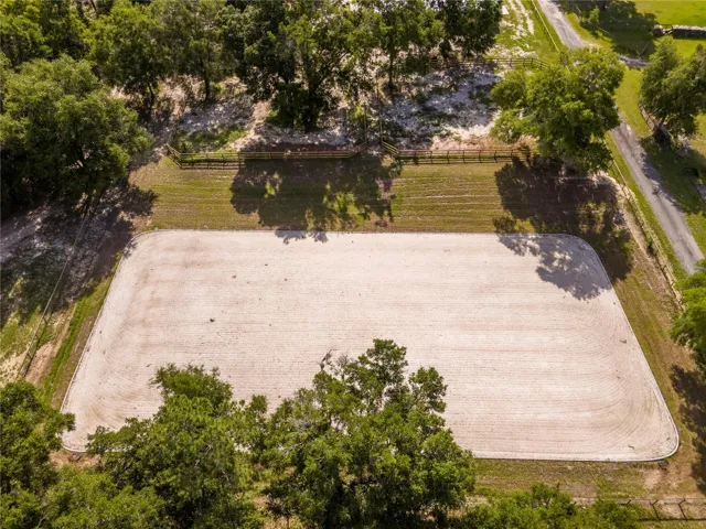 newly constructed 100’ x 200’ riding arena is equipped with premium silica sand and GGT footing, an ebb-and-flow watering system