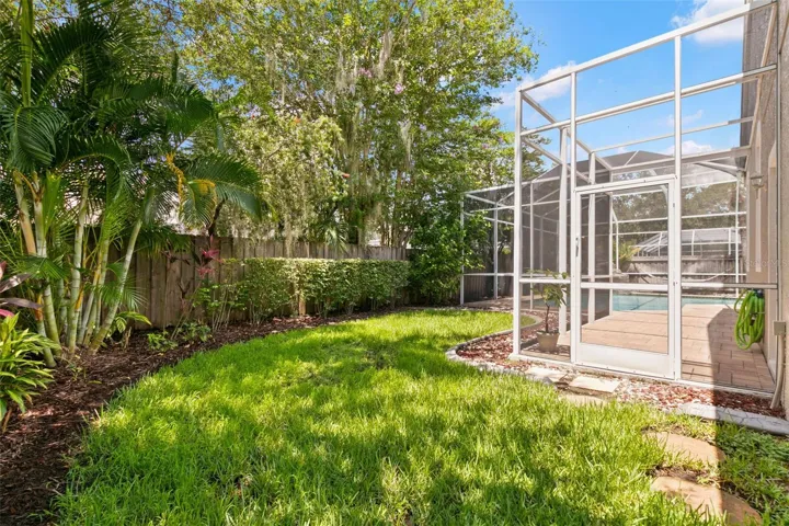 private fenced-in back yard