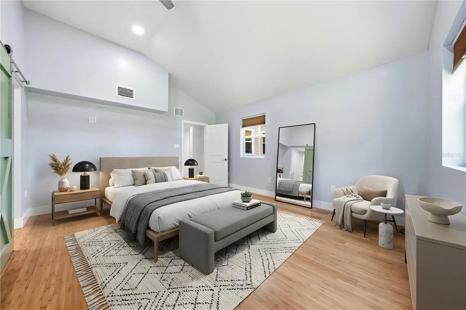 PRIMARY BEDROOM BIRTUALLY STAGED. ON SUITE BATH - MASSIVE WALK IN CLOSET