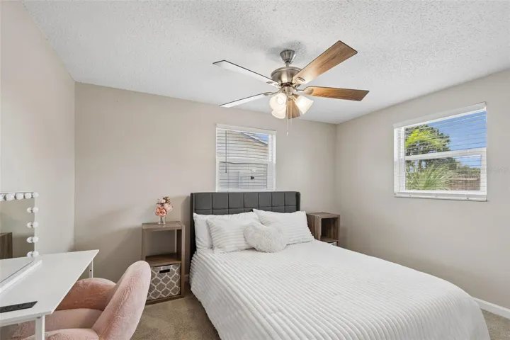 Bedroom #2 have a great view looking out to the pool and backyard sanctuary