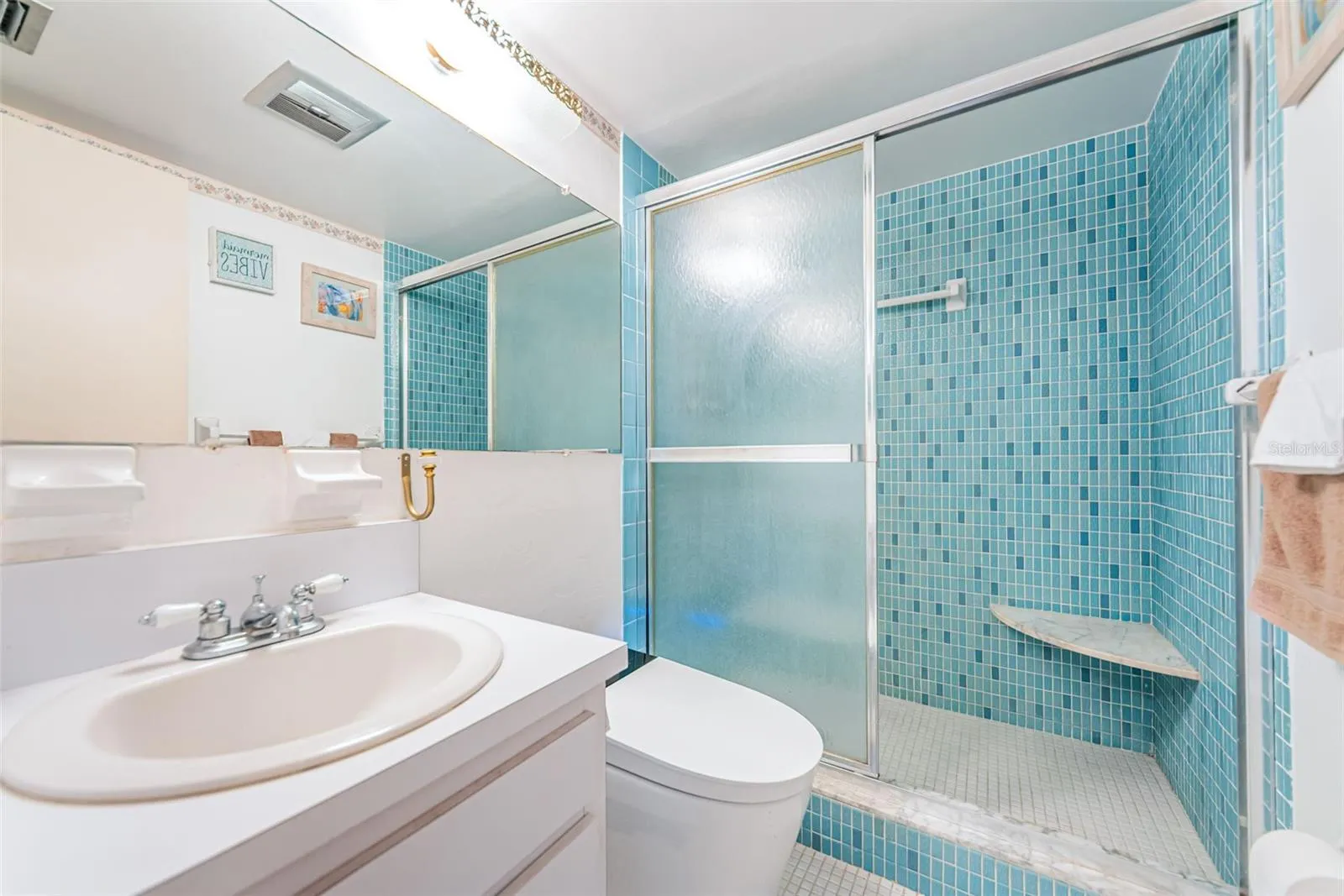 Guest bathroom with walk-in shower and smart toilet
