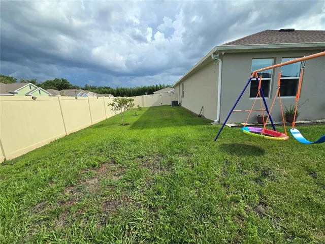 Patio is fenced all around