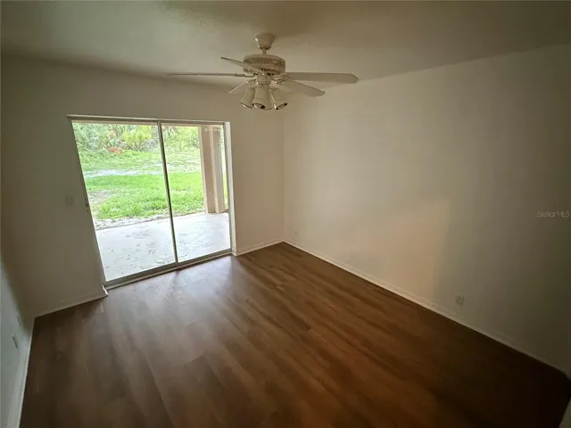 Bedroom Two with sliding doors to lanai and walk in closeet