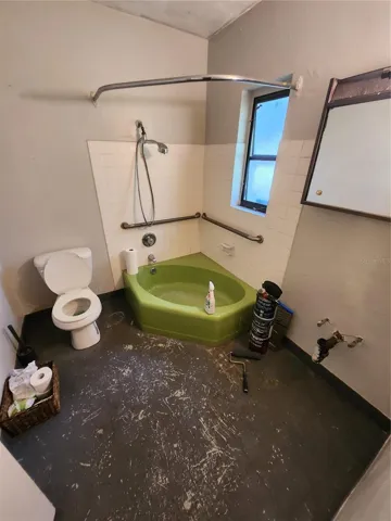 Sport the green , glaze the shower or redesign this bathroom as the perfect master ensuite