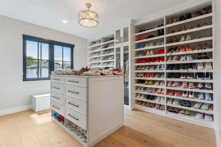 Bedroom #5 is now a custom shoe closet but can be changed back to just a bedroom.