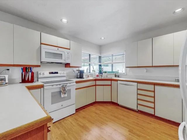 Appliances virtually new. Windows look out unto the Courtyard area