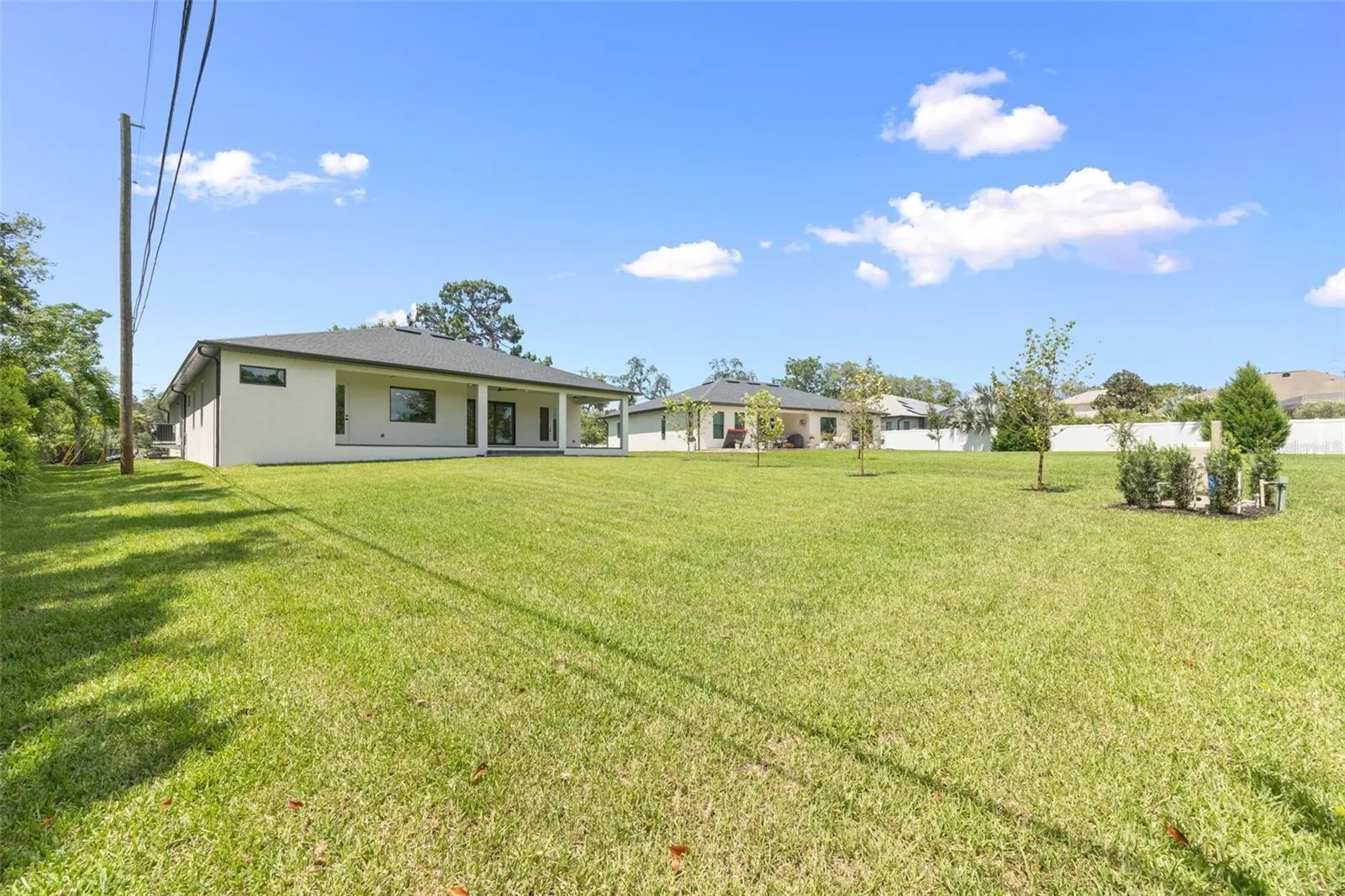 The oversized homesite backing to a conservation area provides a rare combination of privacy, natural beauty, and room to enjoy Florida living at its finest.