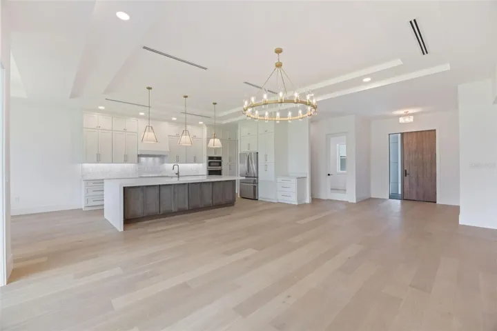 Living Room / Kitchen / Dining area/ Front door.