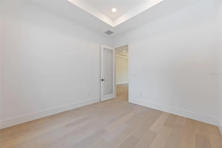 A dedicated office/study room provides the perfect work-from-home space while maintaining privacy from the main living areas.