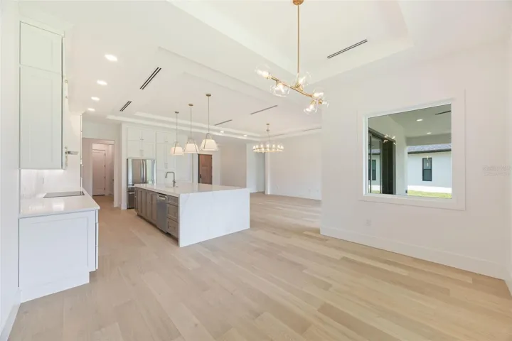 Virtually staged. Light and bright Dining area.