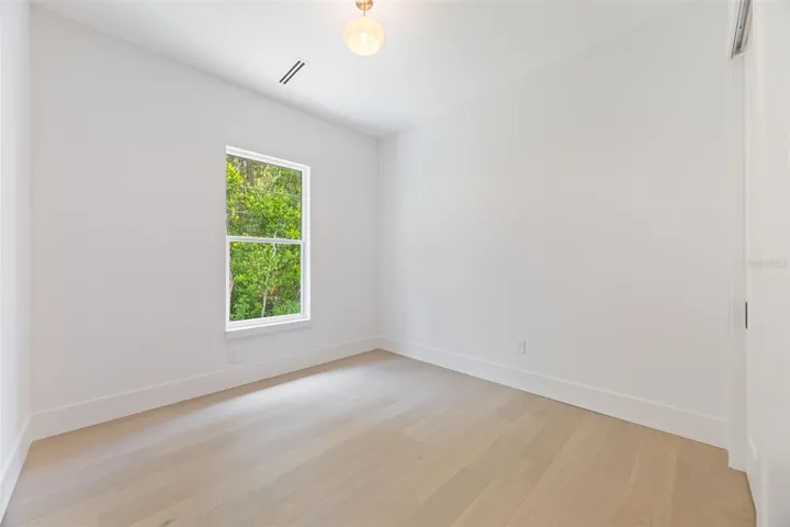 Bedroom 2 is generously sized and conveniently located near a full guest bathroom.