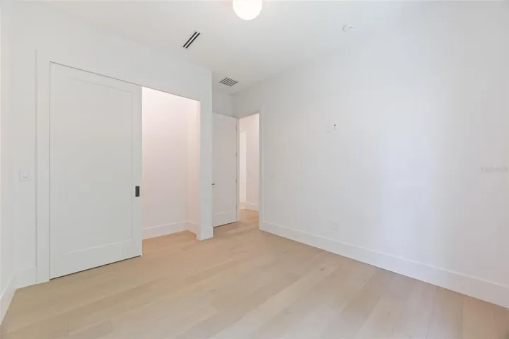 Bedroom 2 is generously sized and conveniently located near a full guest bathroom.