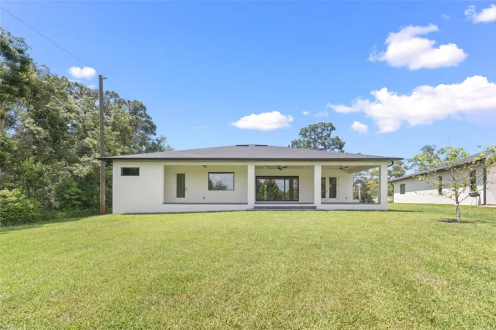The oversized homesite backing to a conservation area provides a rare combination of privacy, natural beauty, and room to enjoy Florida living at its finest.