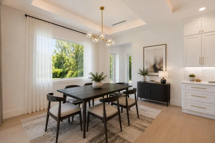 Virtually staged. Light and bright Dining area.