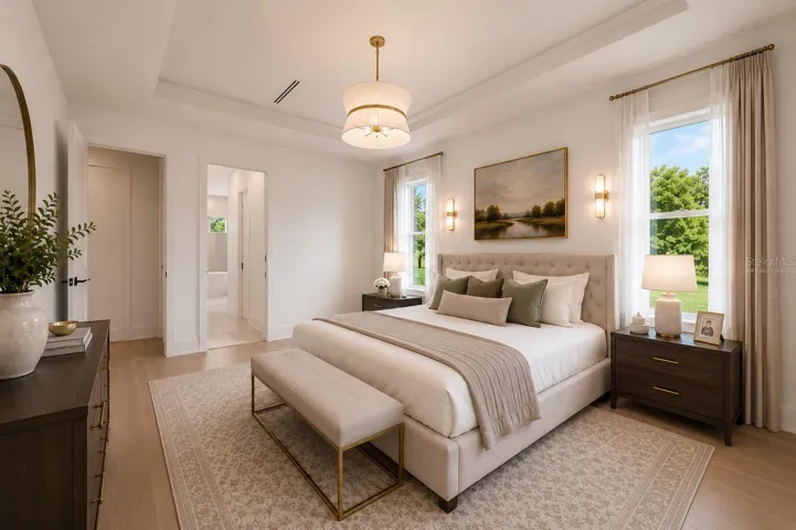 Virtually staged.The luxurious primary suite offers a spa-inspired retreat featuring a freestanding soaking tub, oversized walk-in shower with rain head and handheld shower, premium Italian tile, designer fixtures, and thoughtful custom details throughout.