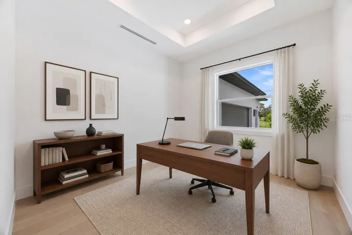 Virtually staged dedicated office / study room.