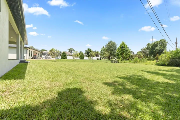 The oversized homesite backing to a conservation area provides a rare combination of privacy, natural beauty, and room to enjoy Florida living at its finest.