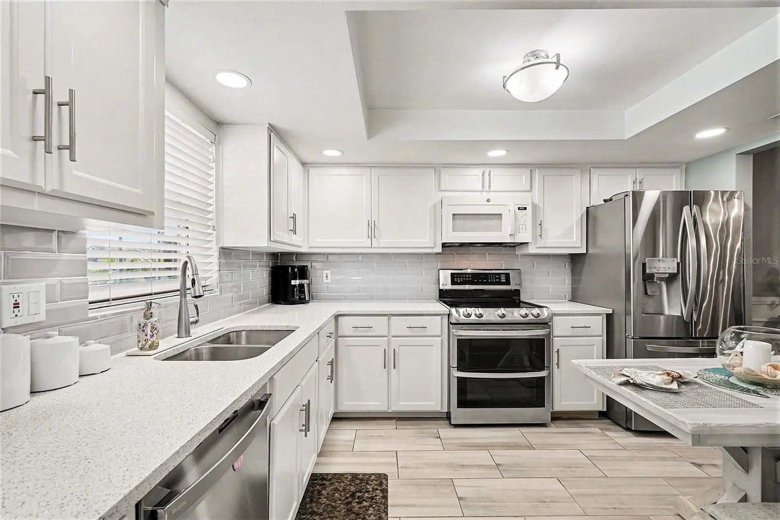 Kitchen view when first walking into the home.