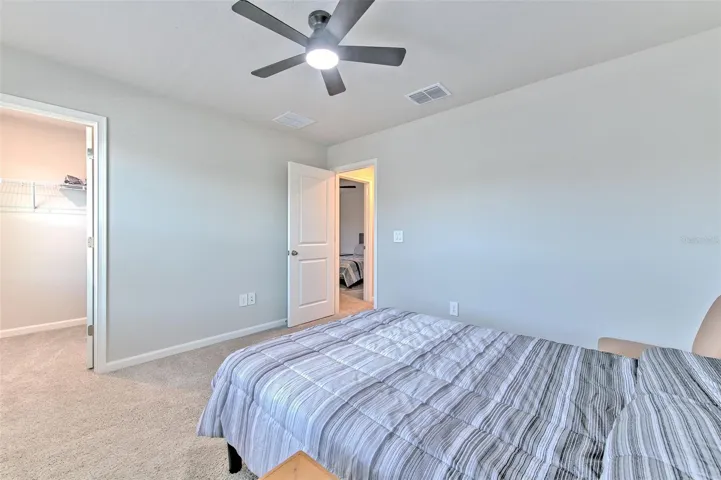 Bedroom 3 with Ceiling Fan & Walk-in Closet