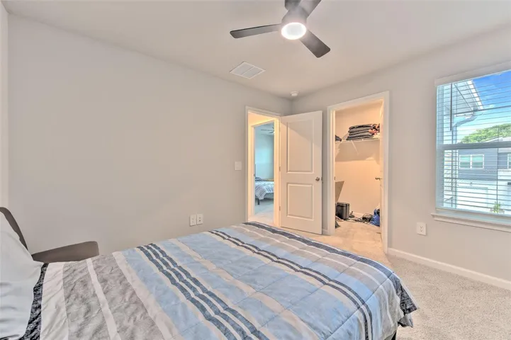 Bedroom 2 with Ceiling Fan & Walk-in Closet