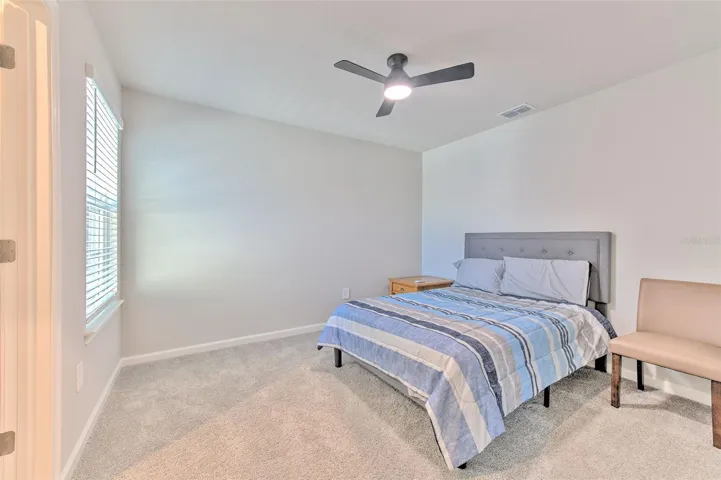 Bedroom 2 with Ceiling Fan & Walk-in Closet